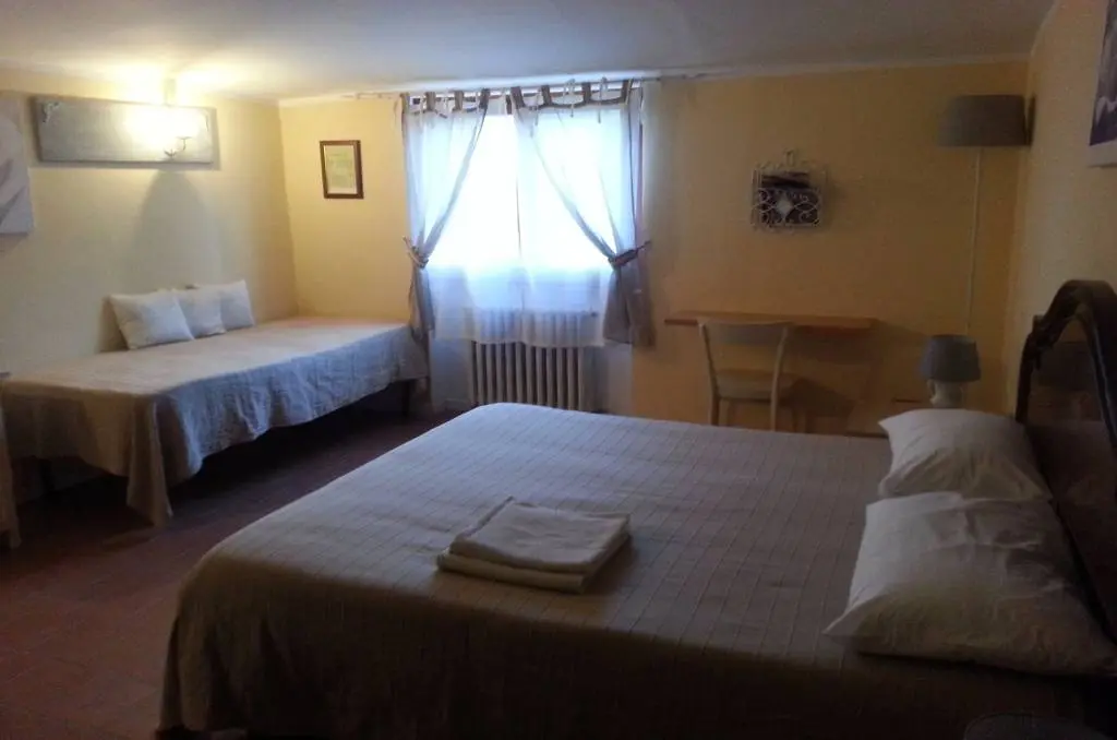 Camera tripla del B&B Il Bosco dei Cervi a Grizzana Morandi